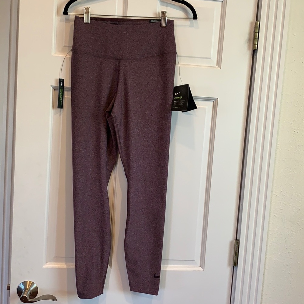 NWT Nike Sculpt Hyper Tight Fit. Size medium. Burgundy